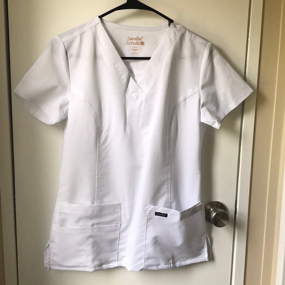 White scrubs set. Bought new & worn once to nurse pinning ceremony